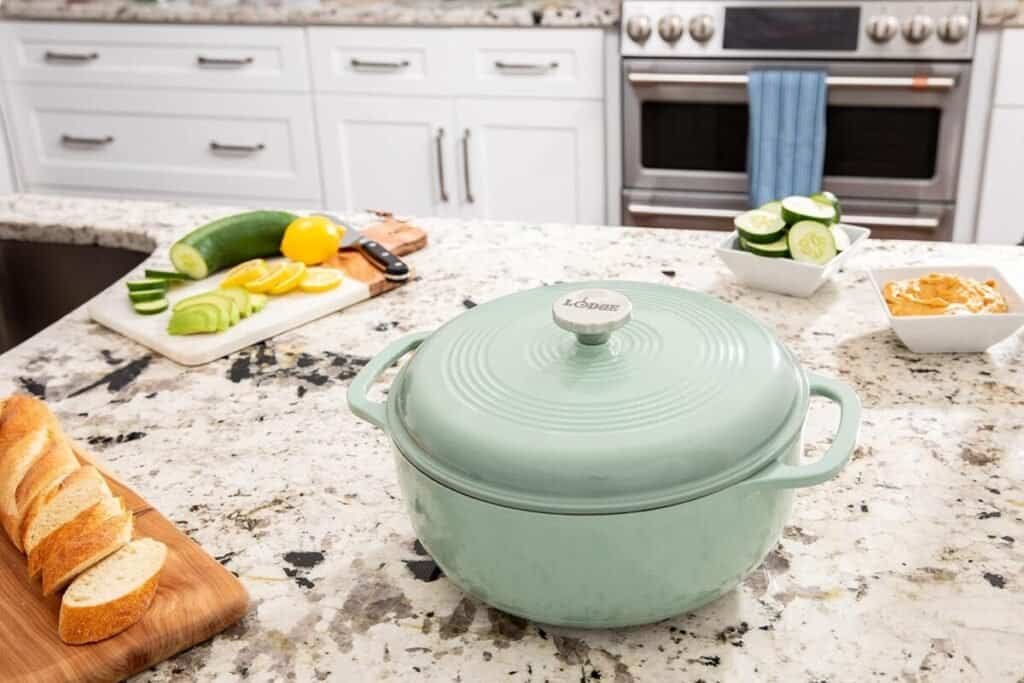 Lodge 6 Quart Enameled Cast Iron Dutch Oven with Lid – Dual Handles – Oven Safe up to 500° F or on Stovetop - Use to Marinate, Cook, Bake, Refrigerate and Serve – Desert Sage